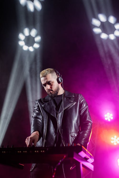 Free A Disk Jockey Performing on Stage Stock Photo