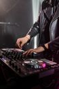 Person in Black Leather Jacket Playing Dj Mixer