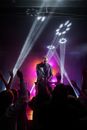 Man in Black Leather Jacket Standing on Stage
