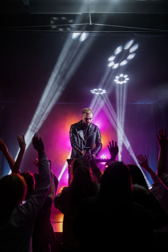 Live music crowd under festival lights
