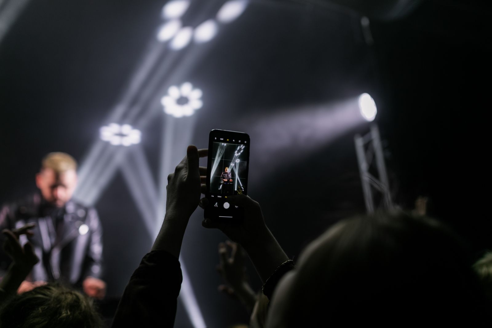 Festival crowd at a live stage during a multi-day event Festival crowd at a live stage during a multi-day event