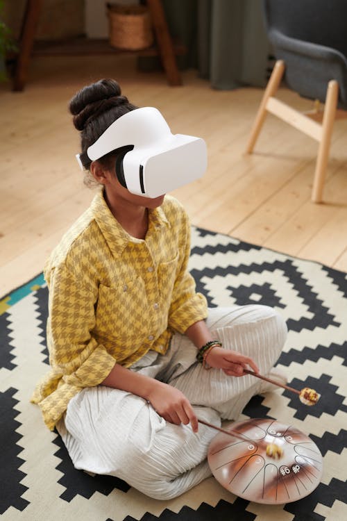 A Girl Wearing VR Goggles Playing Drums