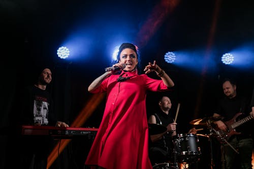 Photo of a Woman Singing