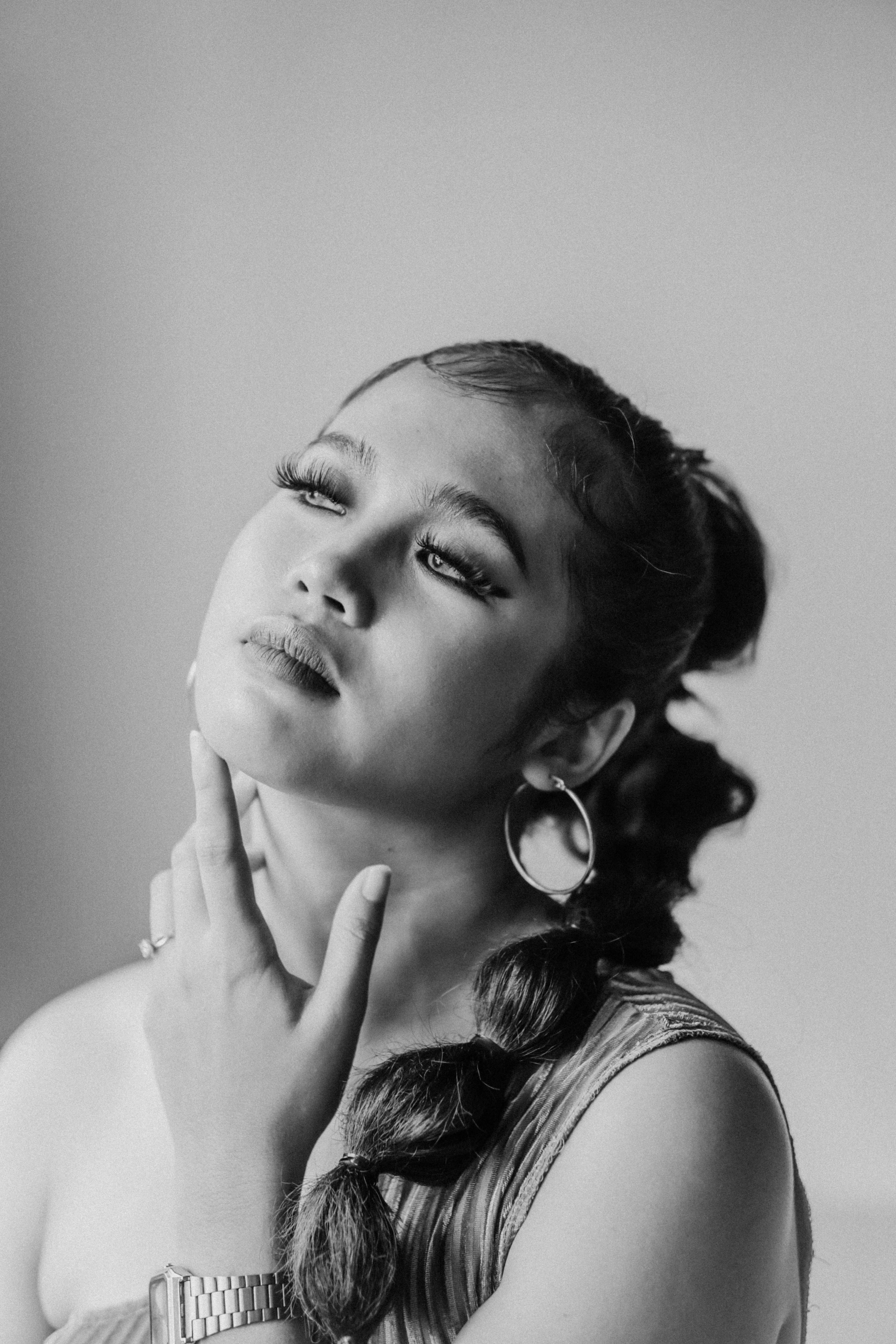 A Beautiful Woman Wearing Hoop Earrings · Free Stock Photo