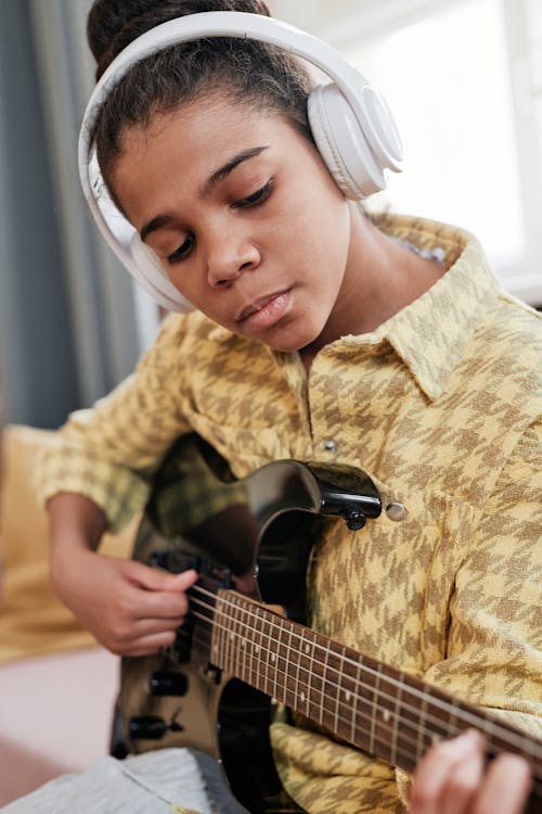 A Woman Playing Guitar