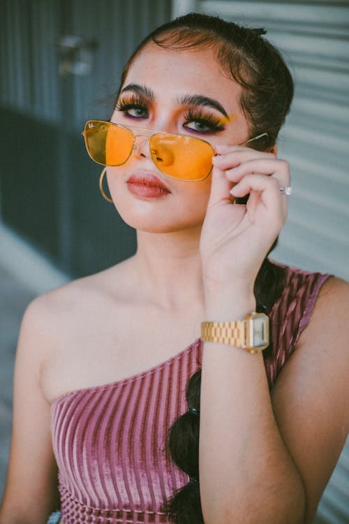 A Woman Wearing Yellow Sunglasses