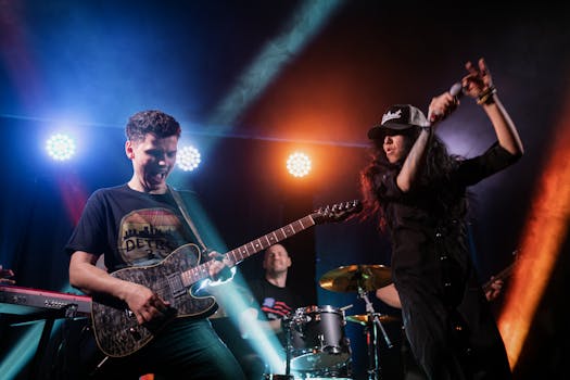 Dynamic concert scene featuring musicians with electric guitar and vibrant stage lights.