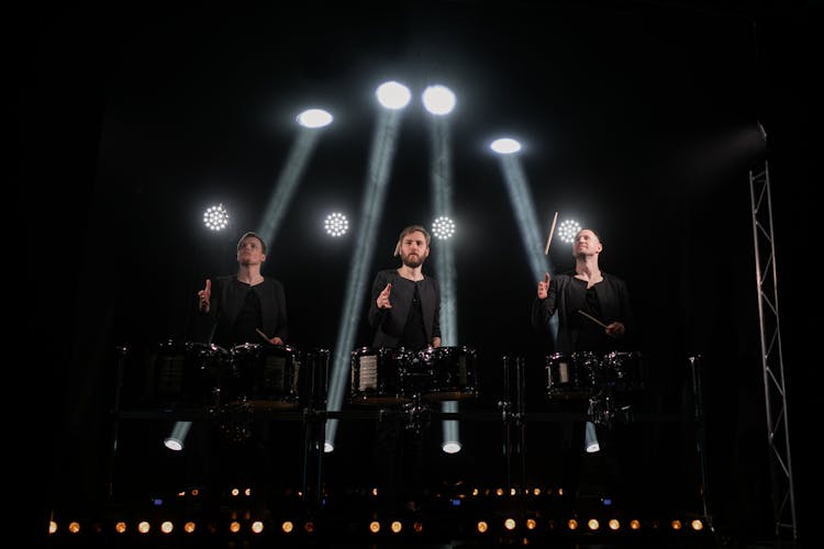 Young Artists Playing Drums On Stage During Show