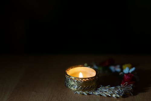 Close-Up Photograph of a Lit Candle