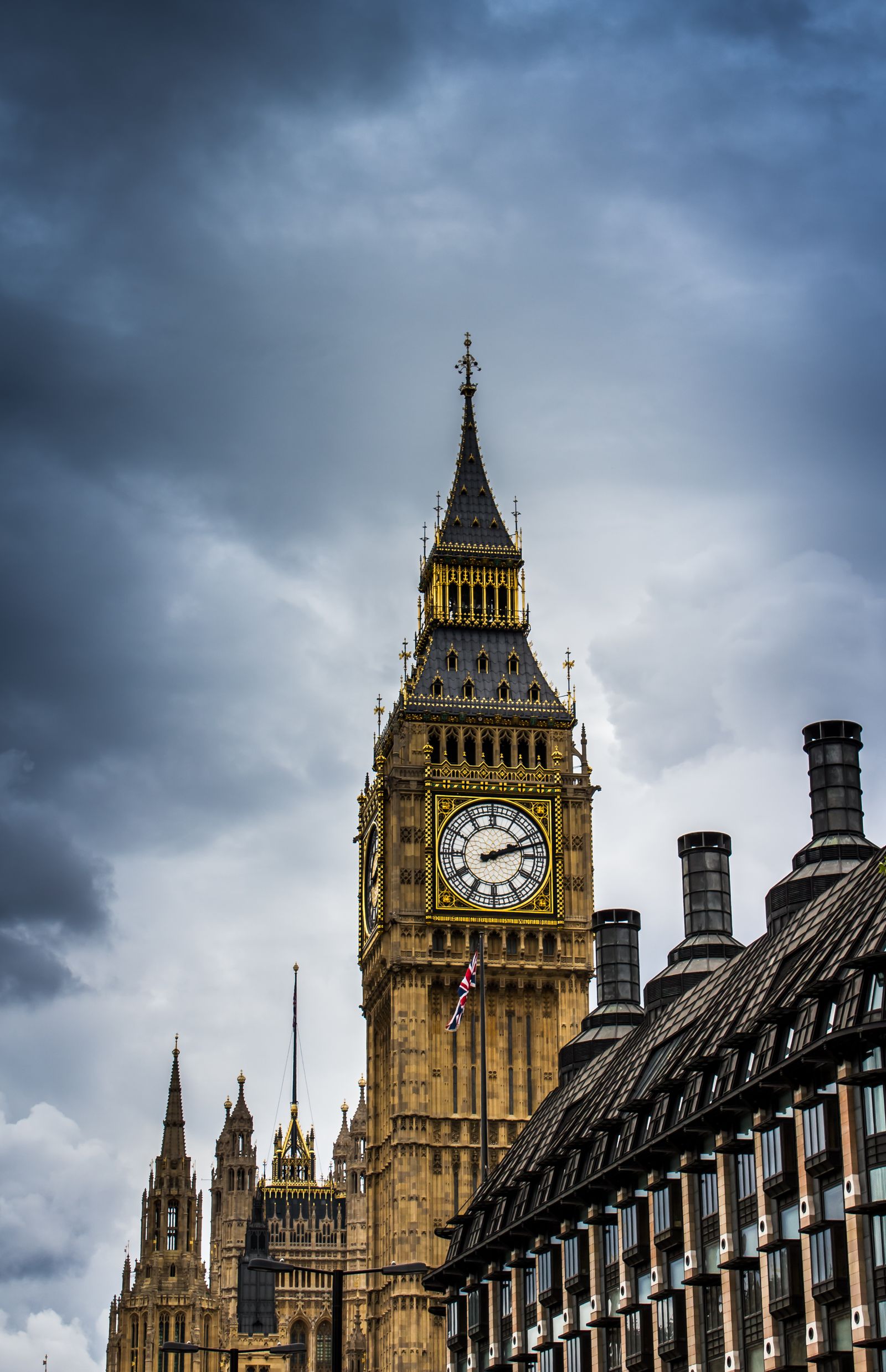 London skyline at dusk with Big Ben, Westminster Bridge and the Houses of Parliament along the Thames