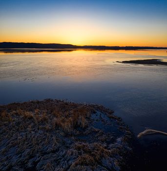 A serene view of the sunrise over the Mississippi River, Minneiska, MN.