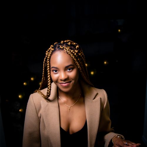 Portrait of Mira Anselm. Photo by Oluwatoki Sayf Al-Fattah on Pexels