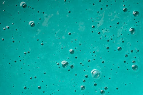 Air Bubbles in Turquoise Liquid