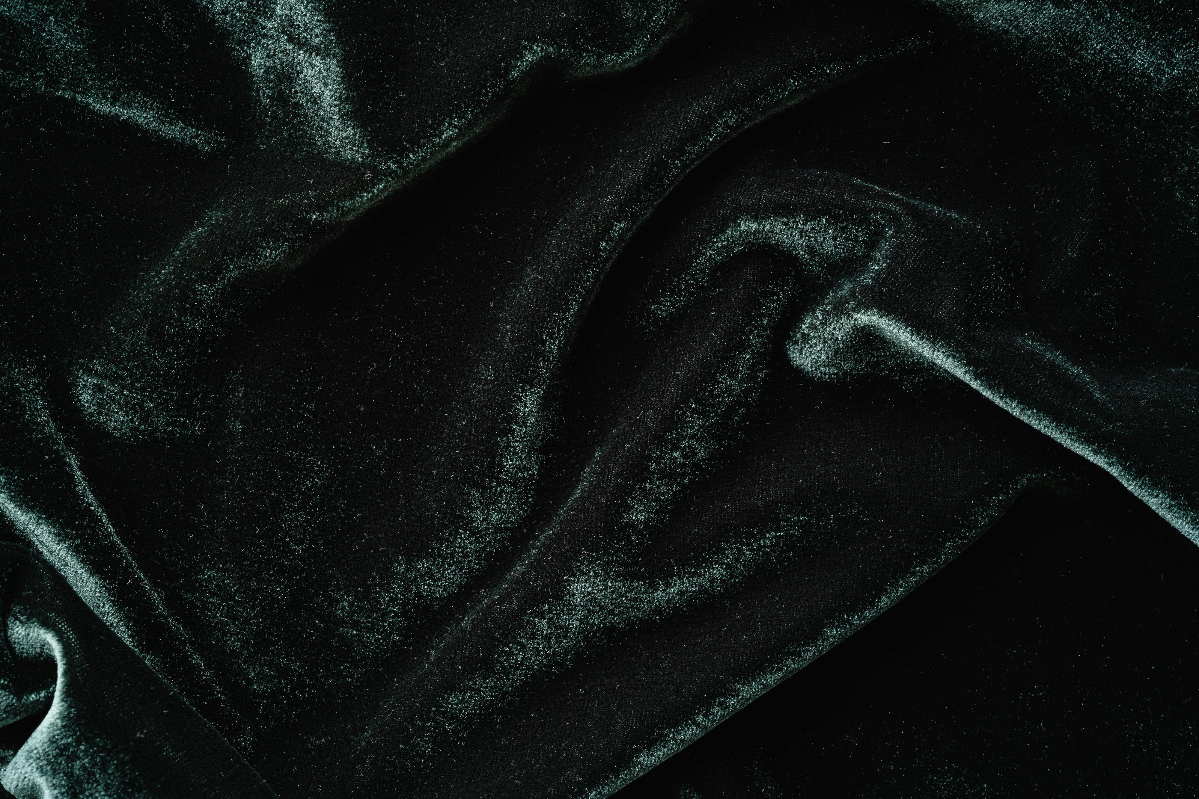 black blanket in close up photography