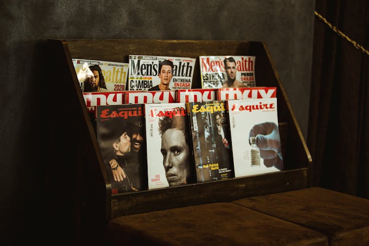 Magazines On Wooden Shelf