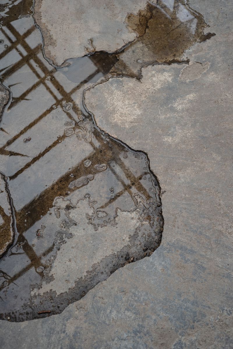 Water pooled on a concrete floor