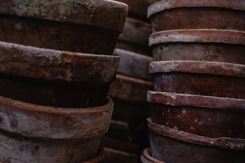 Free Close Up Photo of Pile of Brown Clay Pots Stock Photo