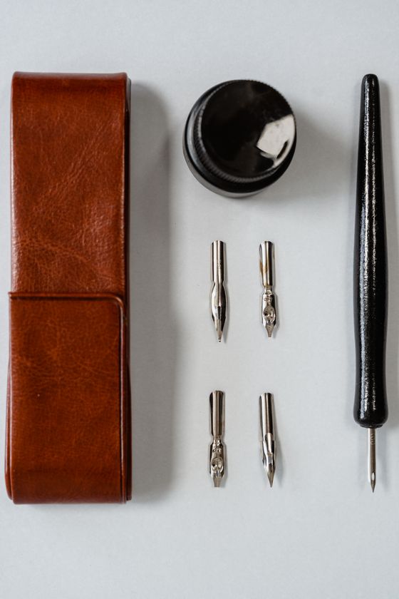 Nib roll and lettering tools — photo by MART PRODUCTION on Pexels