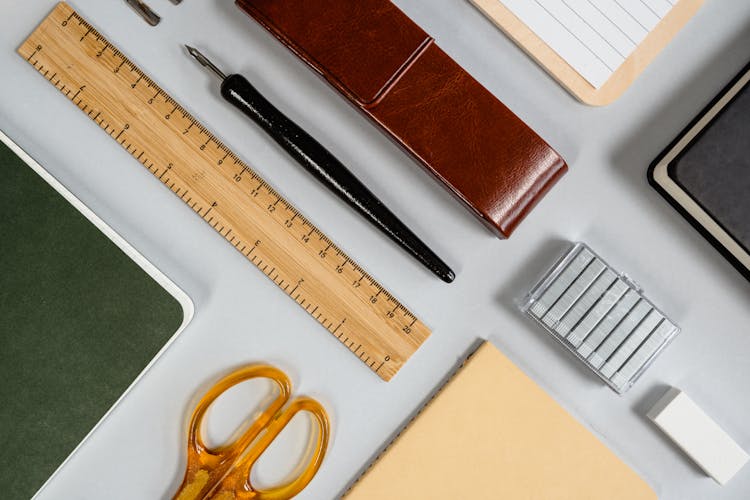 Stationery Items Lying On A Table