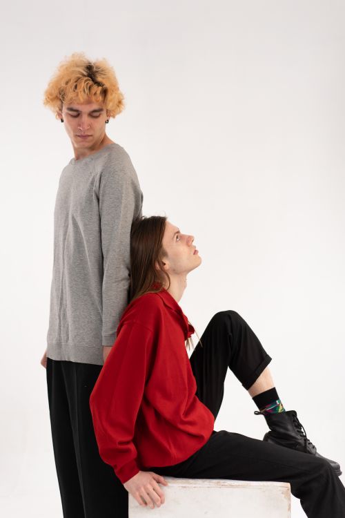 A Couple Leaning against Each Other · Free Stock Photo