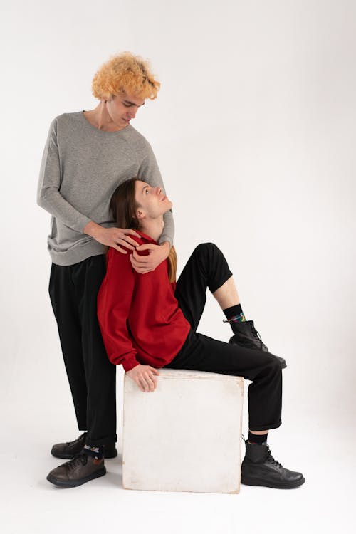 Studio Shot of Models Posing in Sweaters