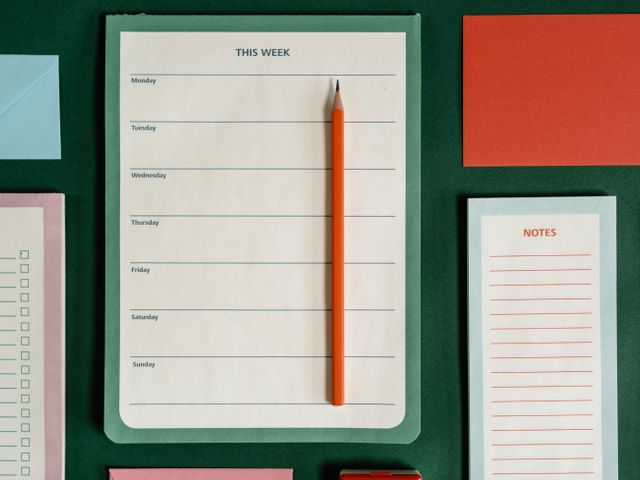 Floor plan of an office being reviewed with pencil notes