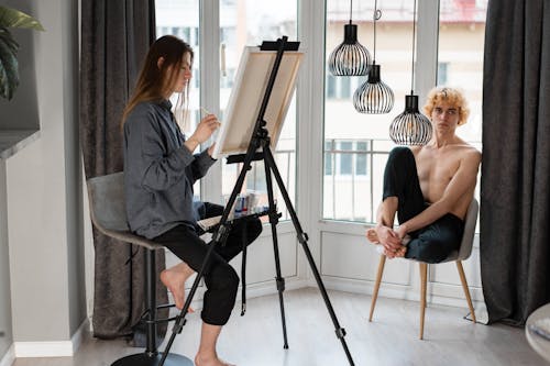Free A Man Doing Painting Stock Photo