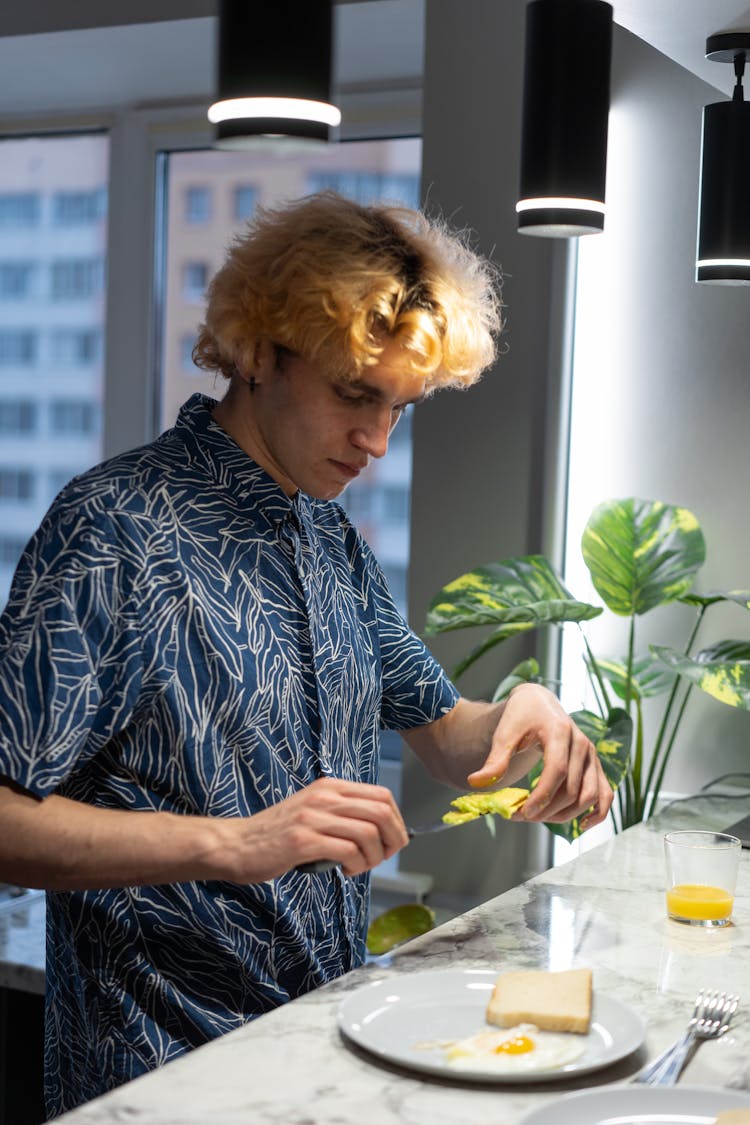 A Man Making A Breakfast