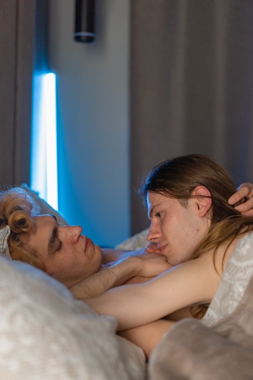 Free A tender moment of a loving couple embracing in a cozy indoor setting, highlighting affection and connection. Stock Photo