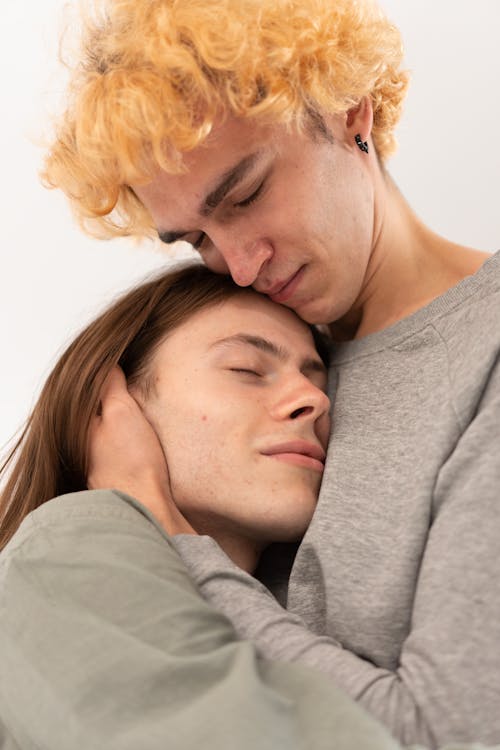 Free Photo of Men Hugging Each Other Stock Photo