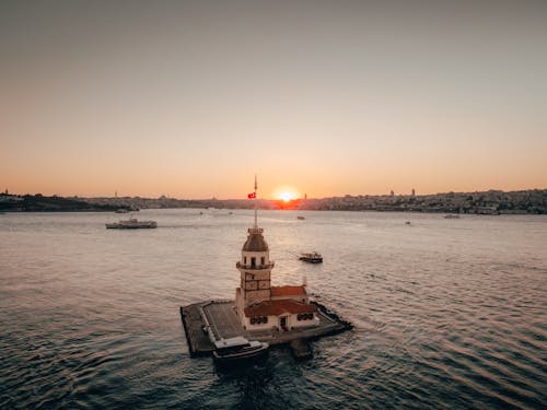 Lighthouse with a Flag on Tower