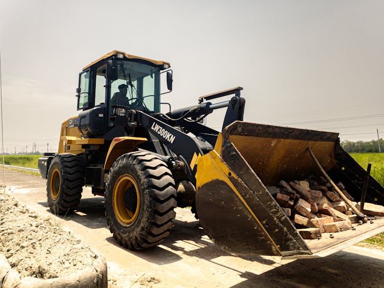 Front Loader With Bricks In Bucket