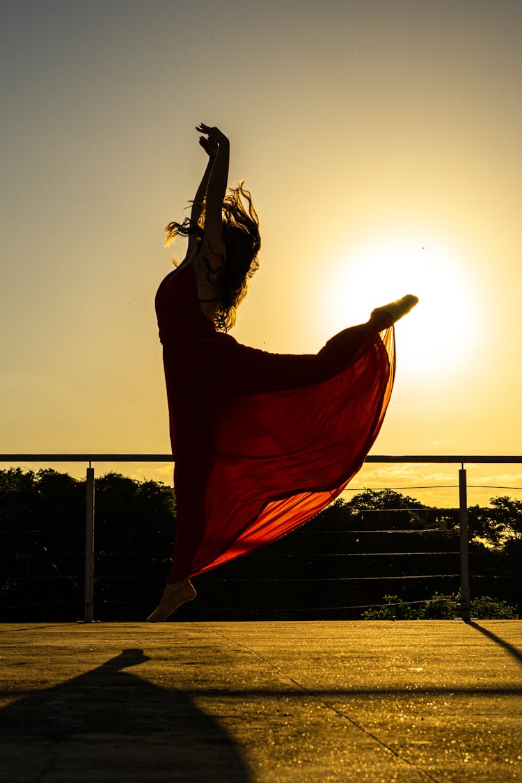 Woman In Red Dress Dancing Ballet