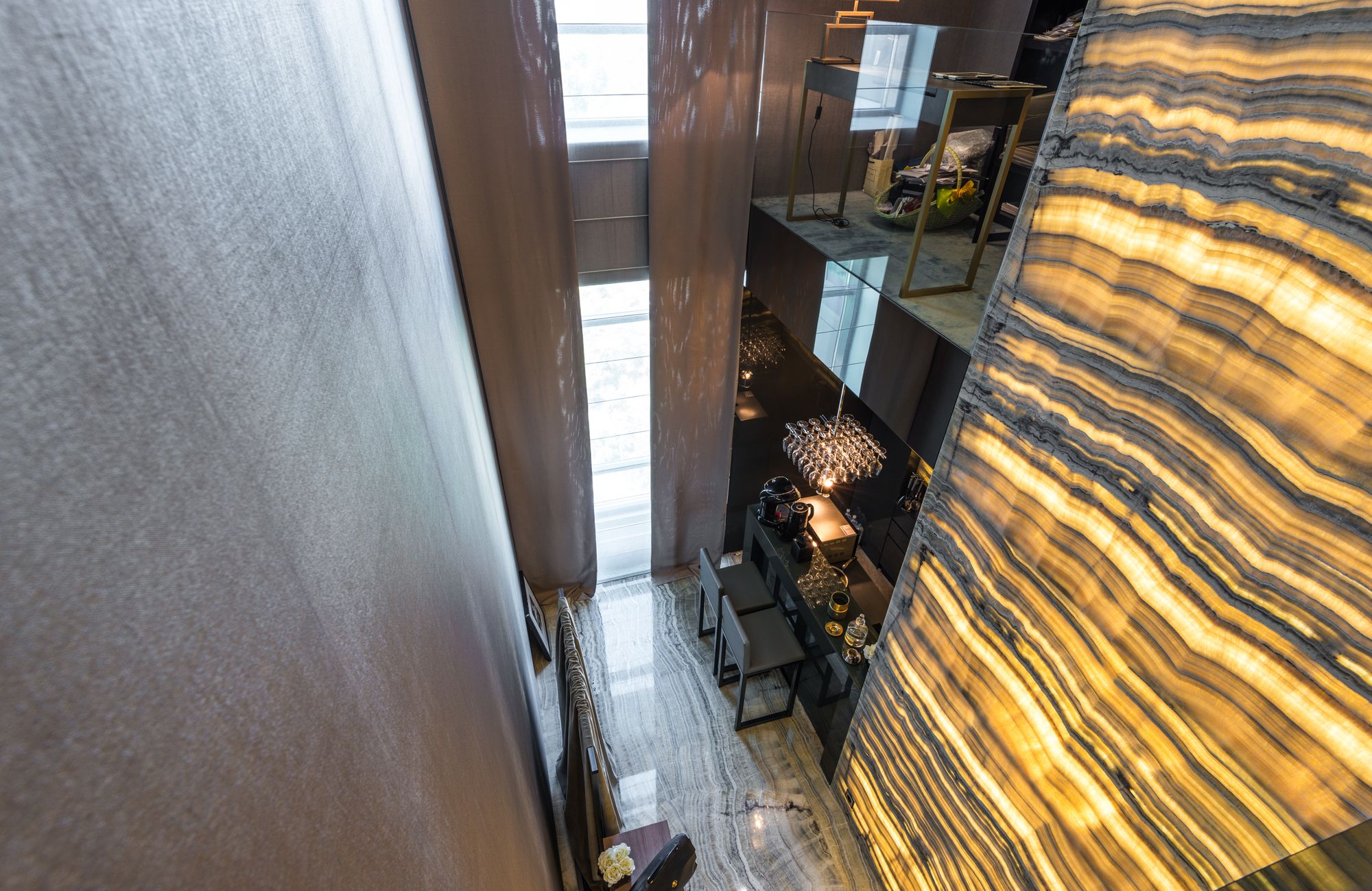 Light-filled modern luxury interior with sculptural lighting