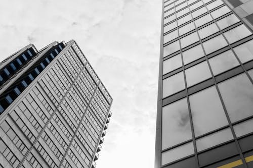 Gray Tall Buildings in Low Angle Shot