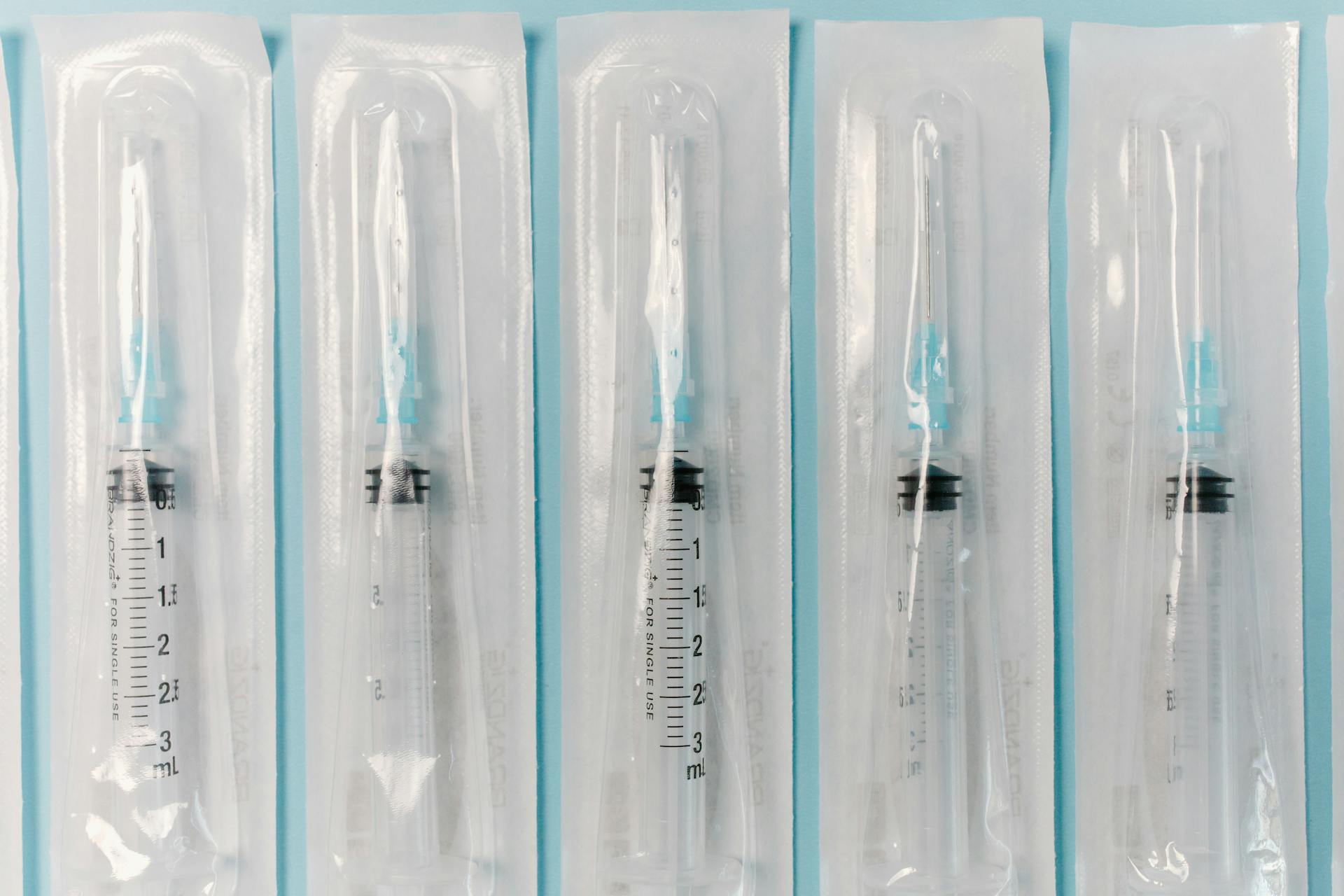 Packs of Syringes in Close-up Photography