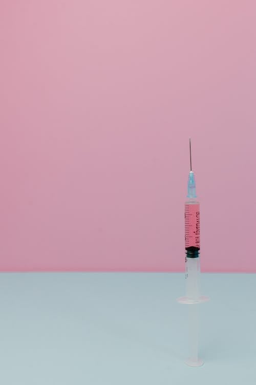 Syringe with Pink Liquid