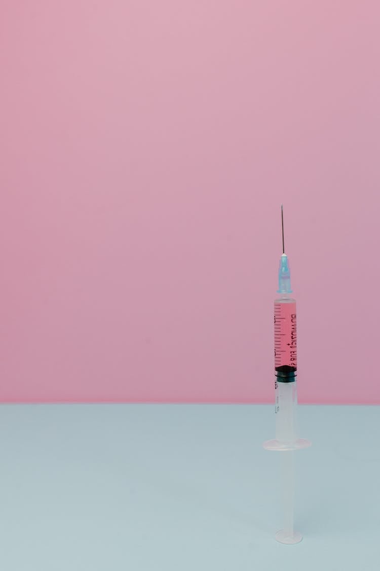 Syringe With Pink Liquid