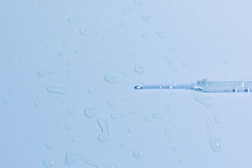 Water Droplets Beside the Glass Pipette