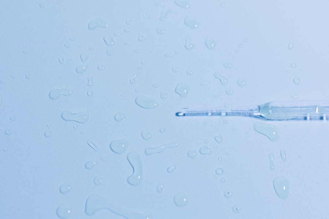 Water Droplets Beside the Glass Pipette