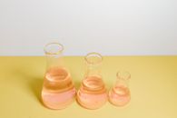 Clear Glass Bottles on White Surface
