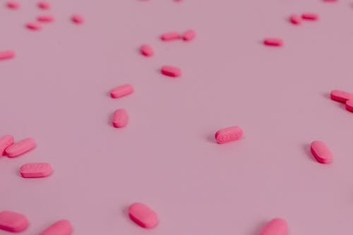 Tablets in Pink Background