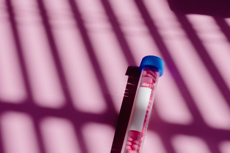 Pink Tablets On Centrifuge Tube