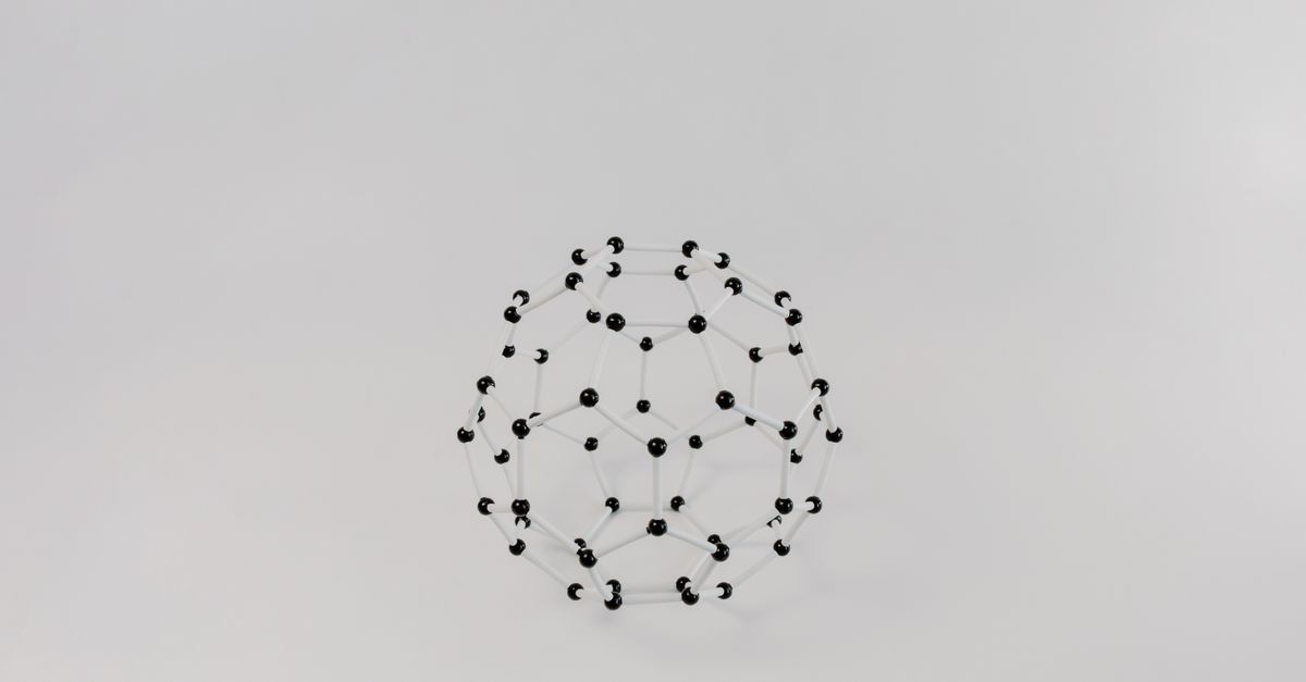 Abstract geometric molecular model with hexagons on white background.