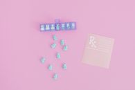 Pink and White Wall Mounted Calendar