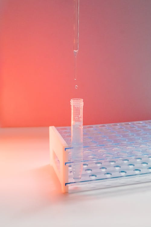 A Liquid Substance Dropping from a Pipette 