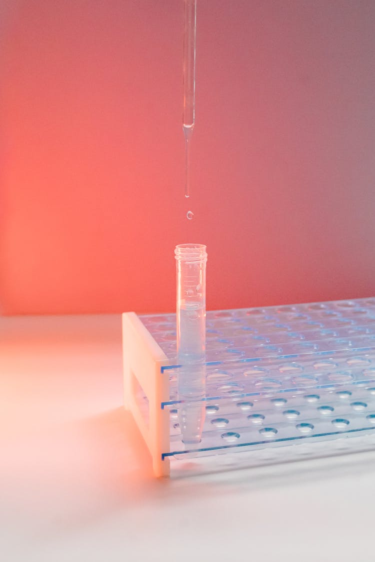 A Liquid Substance Dropping From A Pipette 