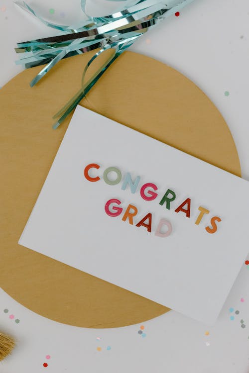 Free Colorful Text on White Paper Stock Photo