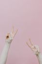 Persons Hand Doing Peace Sign