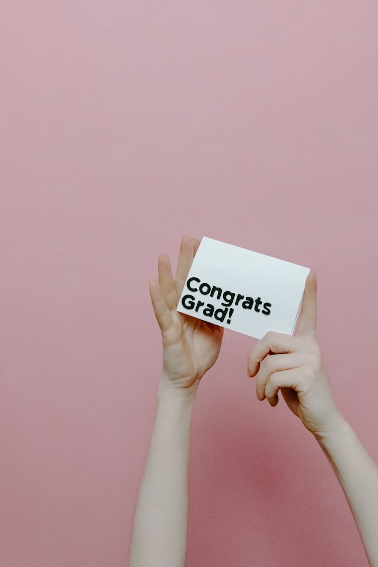 Person Holding A Greeting Card